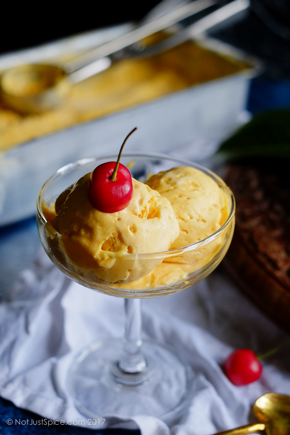 Dreamy Creamy Mango Ice Cream on notjustspice.com