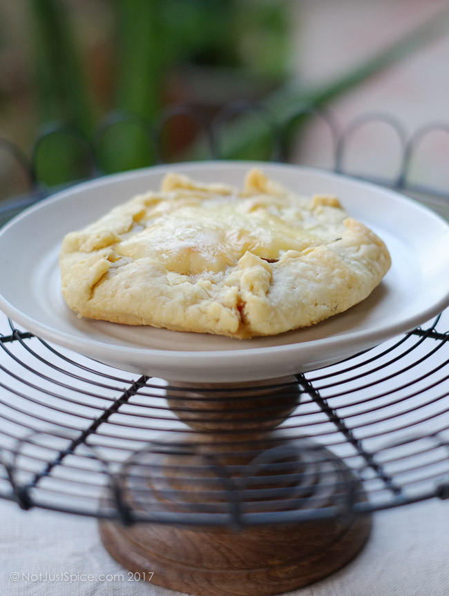Garlicky Mushroom Cheese Galettes with Caramelised Onions and Peppers on notjustspice.com