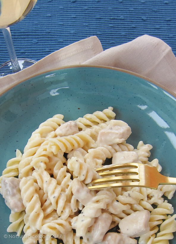 White Sauce Chicken Pasta | Fusilli with White Sauce and Chicken on notjustspice.com